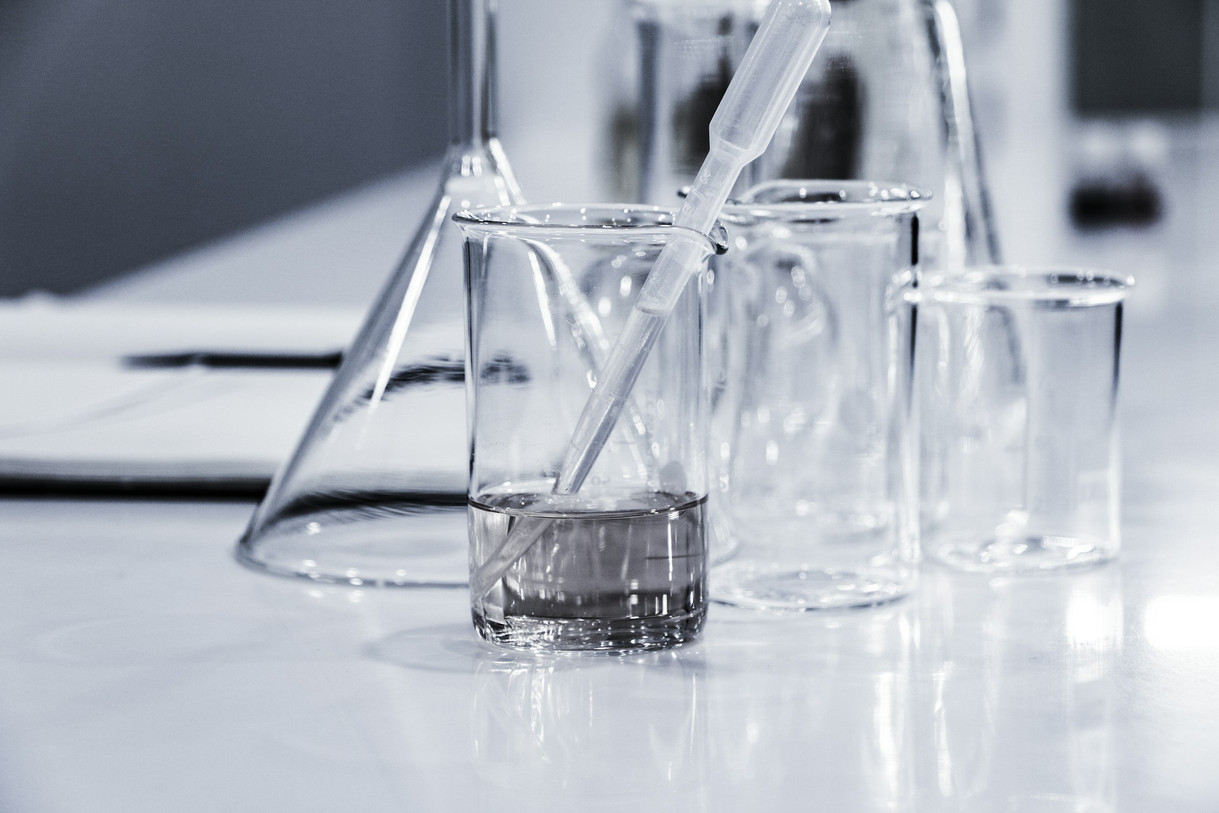 Clean laboratory glassware and pipette used for quality testing